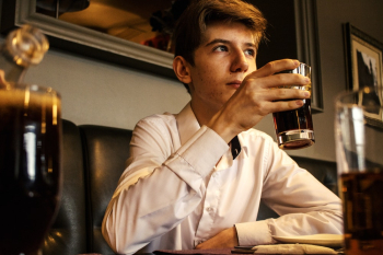 Man Holding Clear Drinking Glass Man Holding Clear Drinking Glass