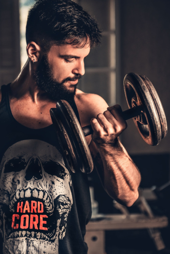 Man Holding Dumbbell Man Holding Dumbbell