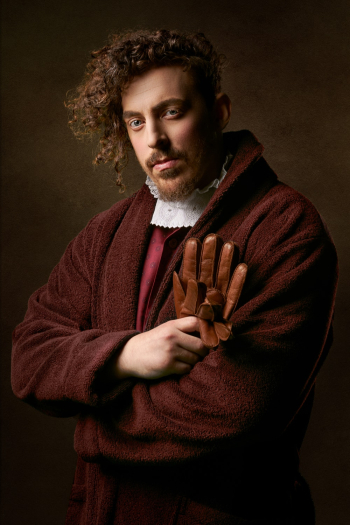 Man Holding Glove Man Holding Glove
