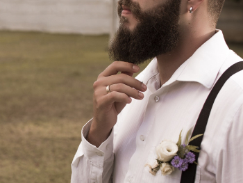 Man Holding His Beard