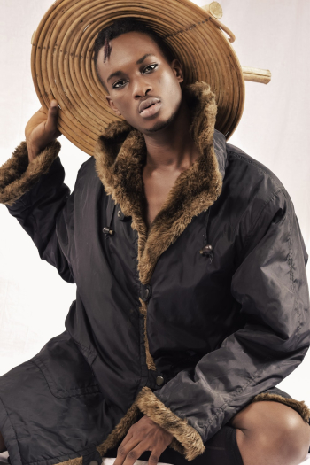 Man Holding His Hat Man Holding His Hat
