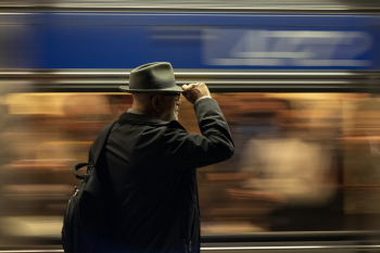 Man Holding His Hat Man Holding His Hat