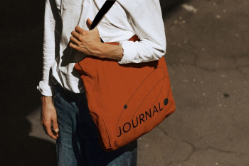 Man holding journal tote bag | Free Photo - rawpixel Man holding journal tote bag | Free Photo - rawpixel