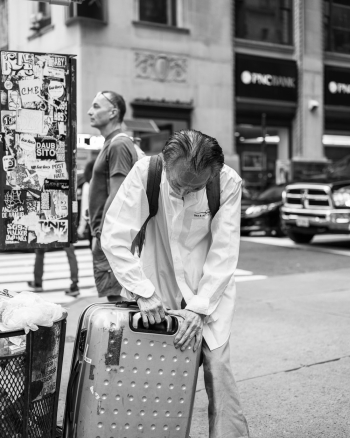 Man Holding Luggage Man Holding Luggage