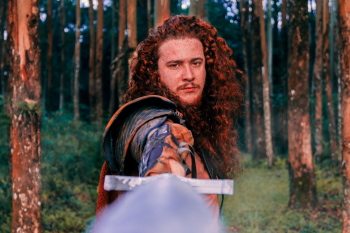 Man Holding Sword Man Holding Sword