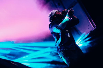 man holding wireless microphone man holding wireless microphone