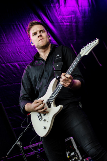 Man in Black Dress Shirt Playing Guitar Man in Black Dress Shirt Playing Guitar