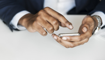 Man in Black Suit Holding Smartphone Man in Black Suit Holding Smartphone