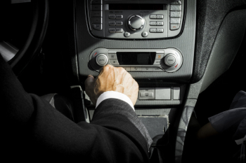 Man in Black Suit Inside Car Man in Black Suit Inside Car