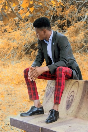 Man In Black Suit Sitting on Bench Man In Black Suit Sitting on Bench