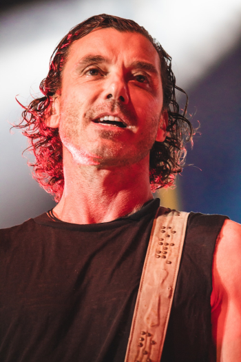 Man in Black Tank Top Playing Guitar Man in Black Tank Top Playing Guitar