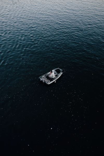 man in gray canoe boat man in gray canoe boat