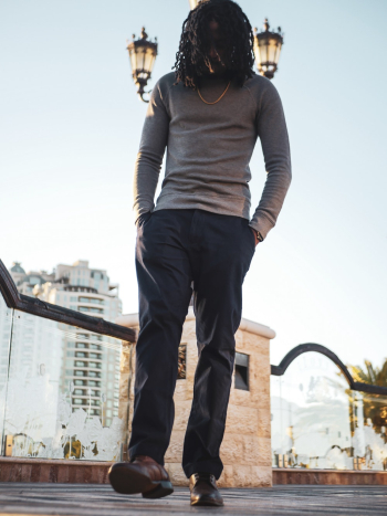 Man in Grey Long-sleeved Shirt and Black Jeans Man in Grey Long-sleeved Shirt and Black Jeans