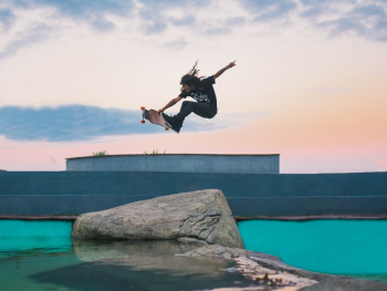 Man In Mid Air With Skateboard Man In Mid Air With Skateboard