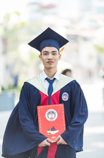 Man In Toga Holding Diploma Man In Toga Holding Diploma