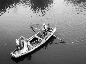 Man in White Boat Man in White Boat