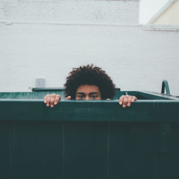 man inside above ground pool