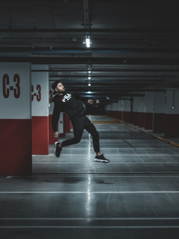 Man Jumping Near Wall Man Jumping Near Wall