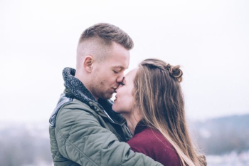 man kissing woman man kissing woman