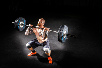 Man Lifting a Barbell Man Lifting a Barbell