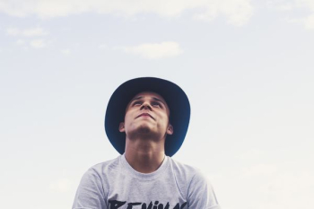 man looking at the skies man looking at the skies