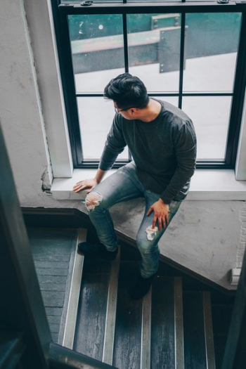 Man Looks Out Window Man Looks Out Window