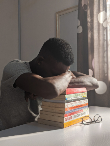 Man Napping on Books Man Napping on Books