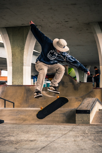 Man on Mid Air Performing Skateboard Trick Man on Mid Air Performing Skateboard Trick