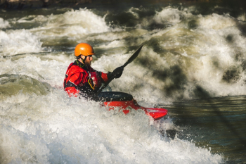 Man on Red Watercraft Man on Red Watercraft