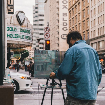 man painting the city man painting the city