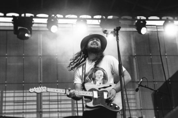 man playing electric guitar man playing electric guitar