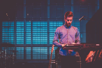man playing electronic keyboard man playing electronic keyboard