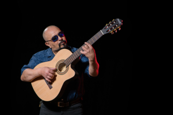 Man Playing Guitar Man Playing Guitar