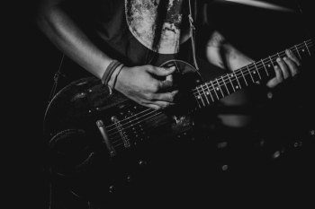 Man Playing Guitar Man Playing Guitar
