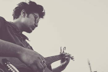 Man Playing Guitar Man Playing Guitar