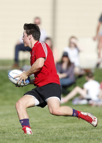 Man Playing Rugby at Daytime Man Playing Rugby at Daytime