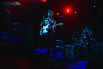 Man Playing Singing and Playing Guitar Man Playing Singing and Playing Guitar