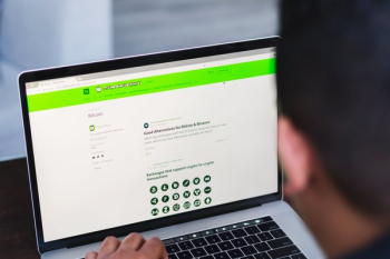 Man Reading Hackernoon Bitcoin Article Man Reading Hackernoon Bitcoin Article