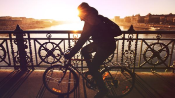man riding bicycle in silhouette painting man riding bicycle in silhouette painting