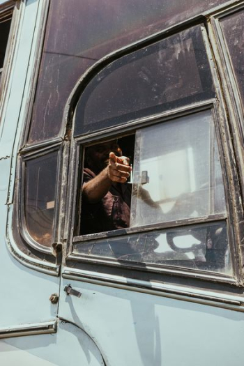 man riding bus man riding bus
