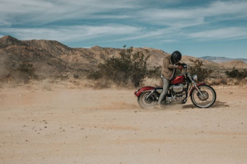 man riding cruiser motorcycle man riding cruiser motorcycle