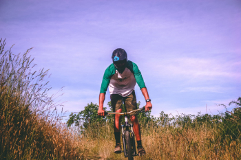 Man Riding His Mountain Bike Man Riding His Mountain Bike