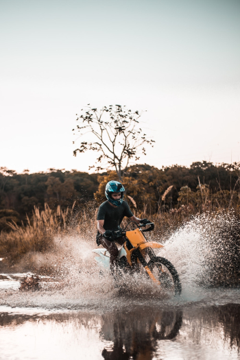 Man Riding Motocross Dirt Bike Man Riding Motocross Dirt Bike
