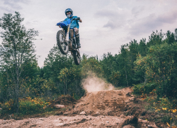 Man Riding Motocross Dirt Bike Man Riding Motocross Dirt Bike