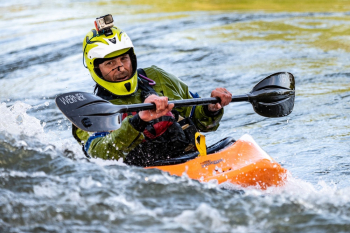 Man Riding Orange Kayak Boat Man Riding Orange Kayak Boat