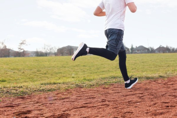 Man Running At The Track