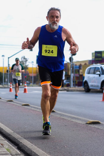 Man Running Marathon Doing Two Thumbs Up Man Running Marathon Doing Two Thumbs Up