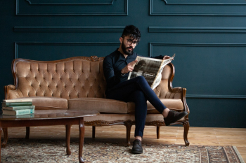 Man Seating On Couch Man Seating On Couch