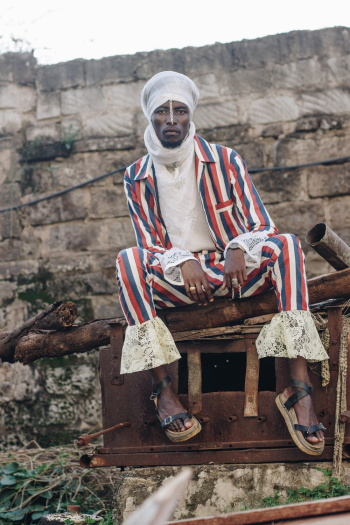 Man Sitting on Brown wood Man Sitting on Brown wood