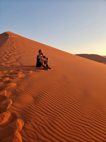 Man Sitting on Desert Man Sitting on Desert